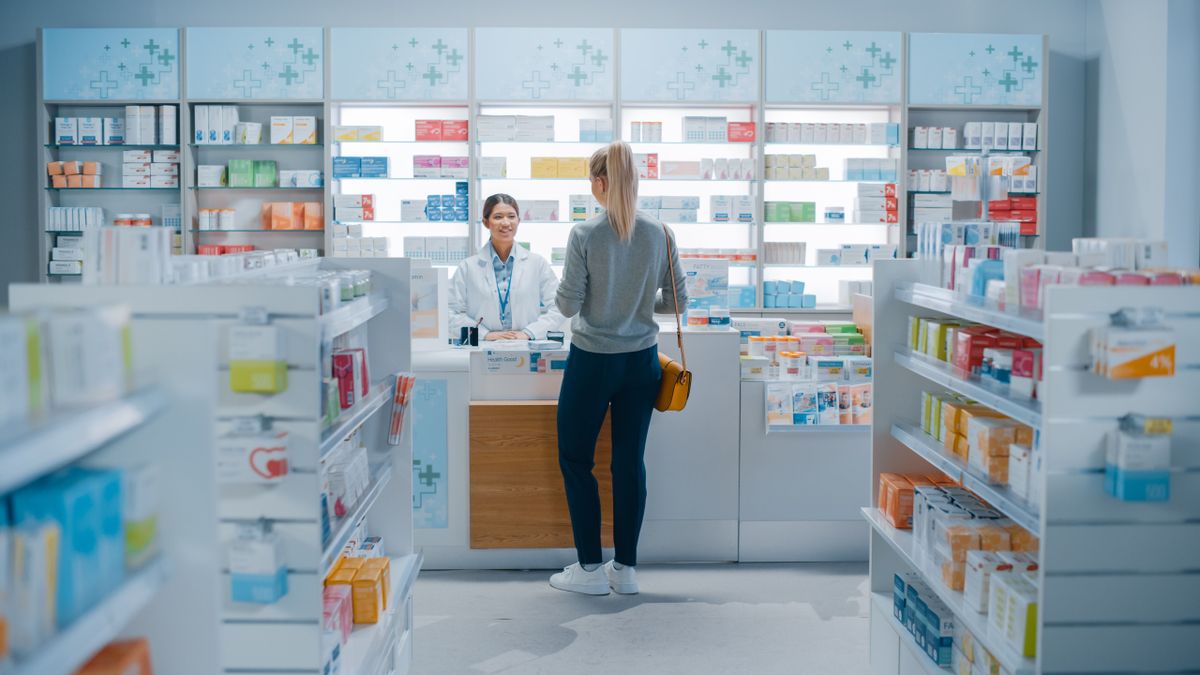 Pharmacy,Drugstore:,Beautiful,Young,Woman,Buying,Medicine,,Drugs,,Vitamins,Stands