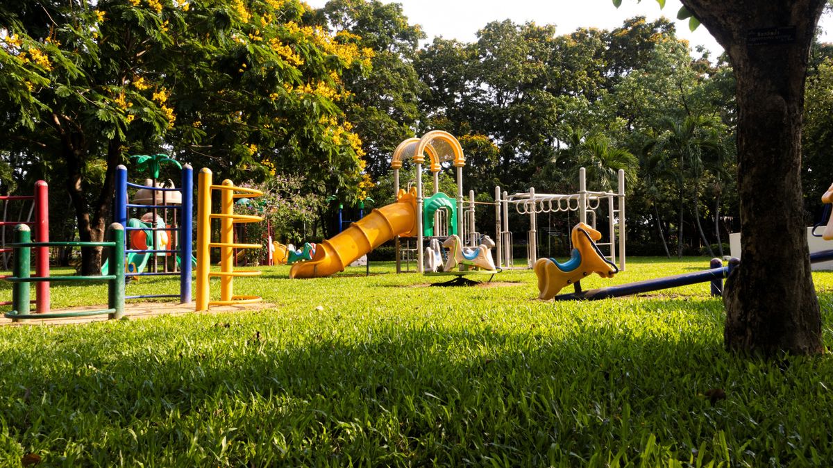 A,Children,Colorful,Playground,On,Yard,In,The,Park.,The