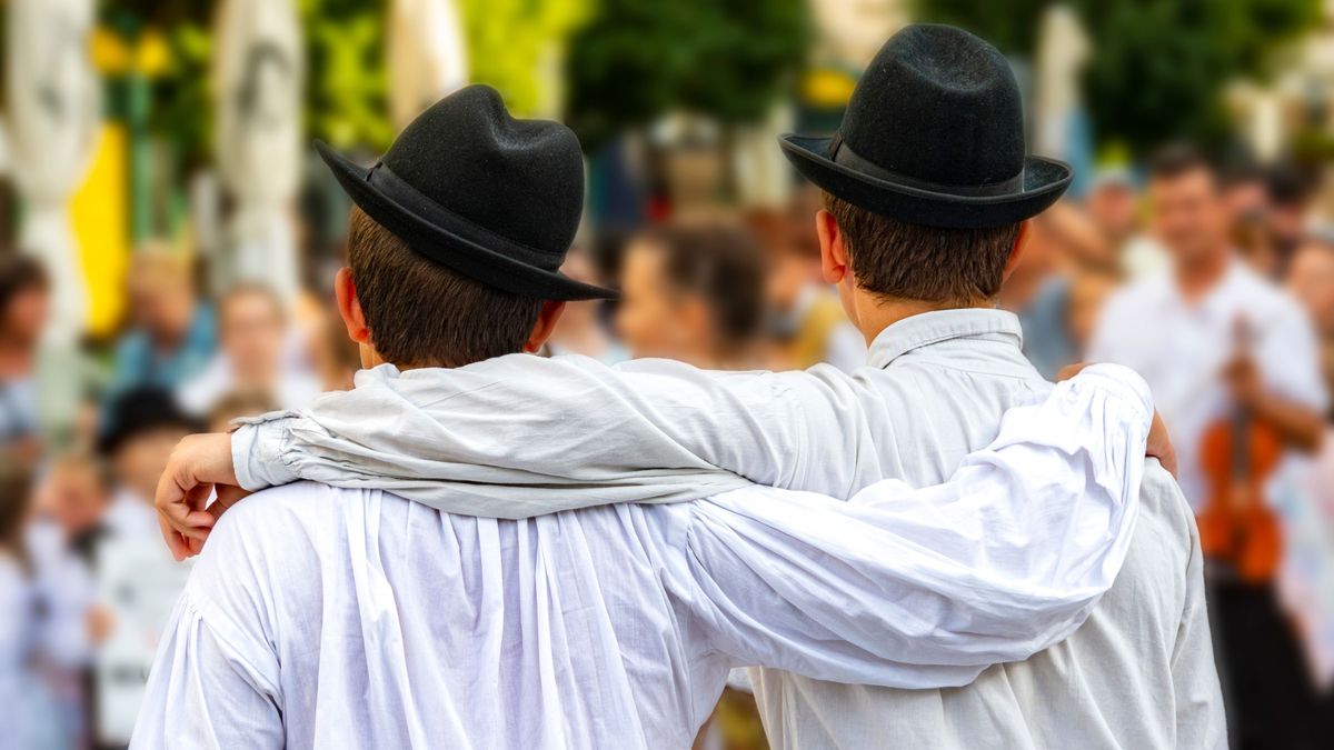 Two,Folk,Dancing,Boys,In,White,Shirts,And,Hats