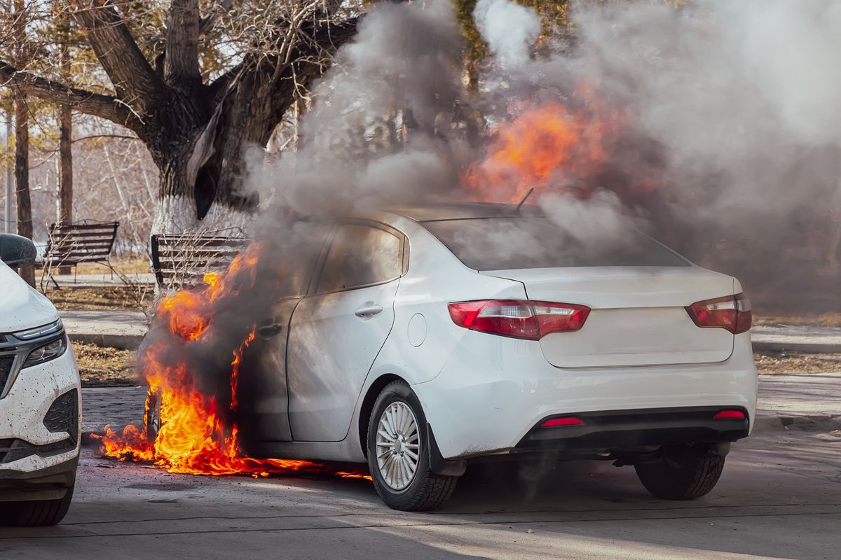 Burning,Car.,Fire,Of,A,White,Passenger,Car,In,A