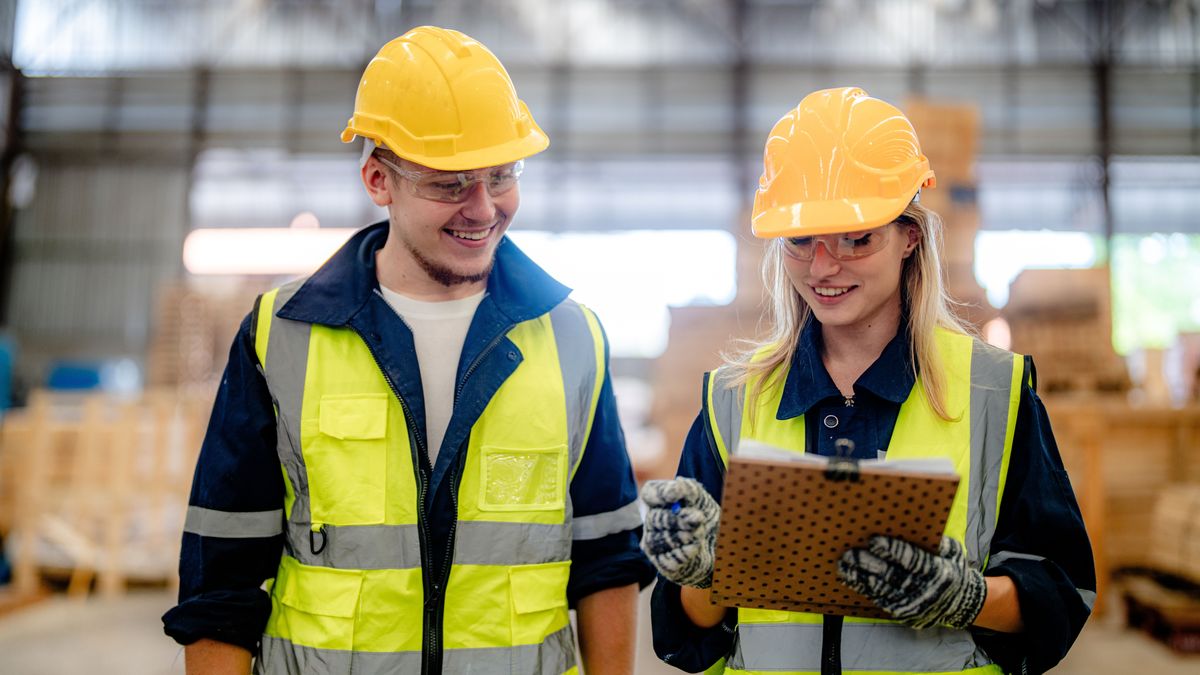 Workers,Man,And,Woman,Engineering,Walking,And,Inspecting,With,Working