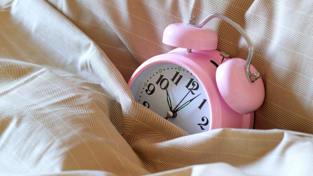 Alarm clock in bed