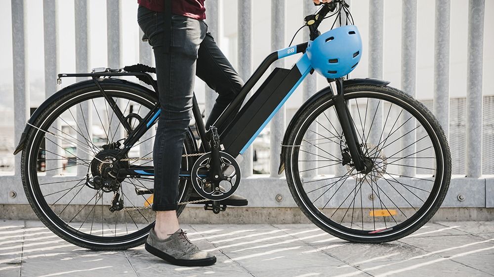 Urban,Cyclist,Taking,A,Brake,On,E-bike