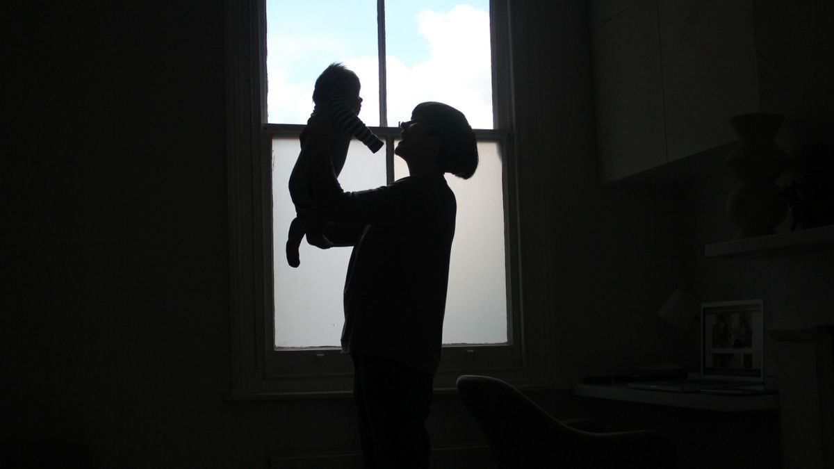 Silhouette of mum and baby