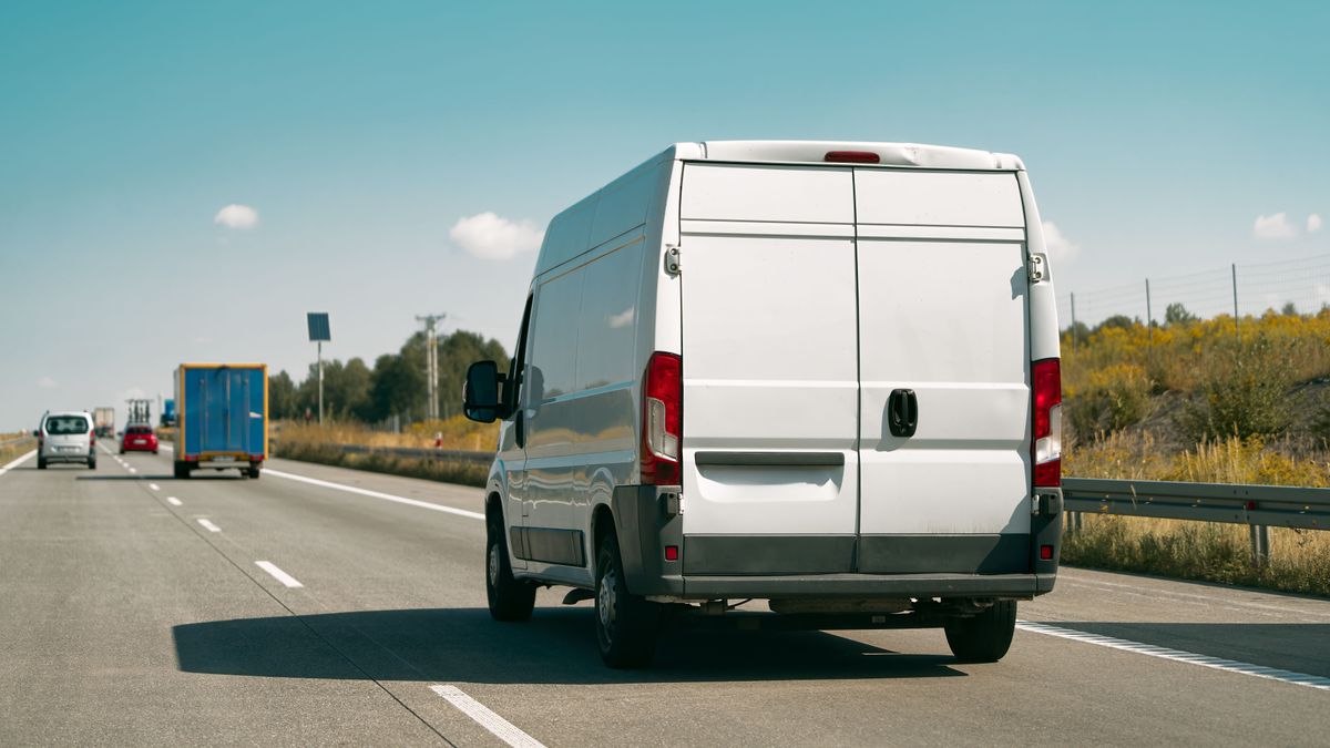 White,Delivery,Van,On,Open,Road