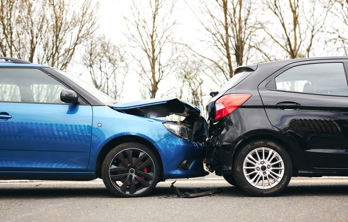 Two,Cars,Involved,In,Traffic,Accident,On,Side,Of,The