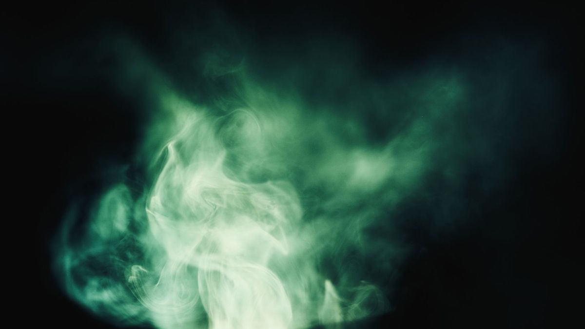 Whirling smoke in shades of green
