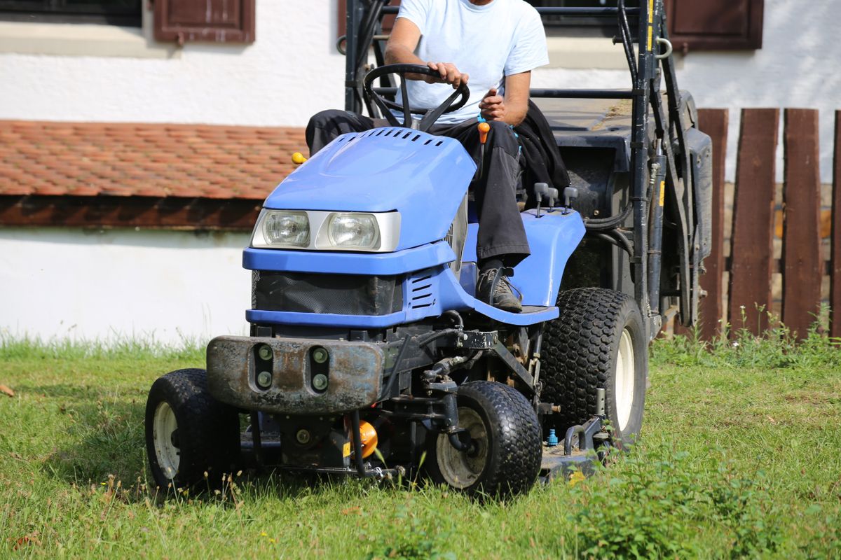 Mowing,The,Lawn,With,A,Lawn,Tractor